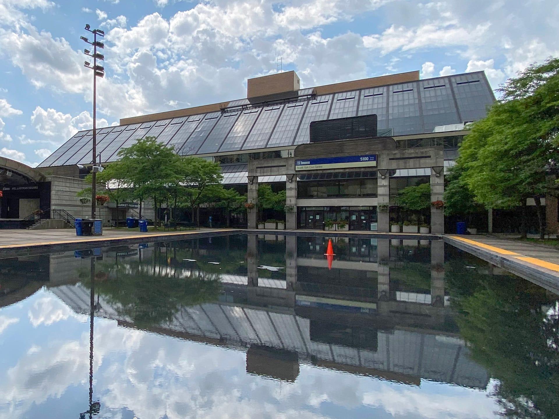 North York Civic Centre reflected in the pool in front of it